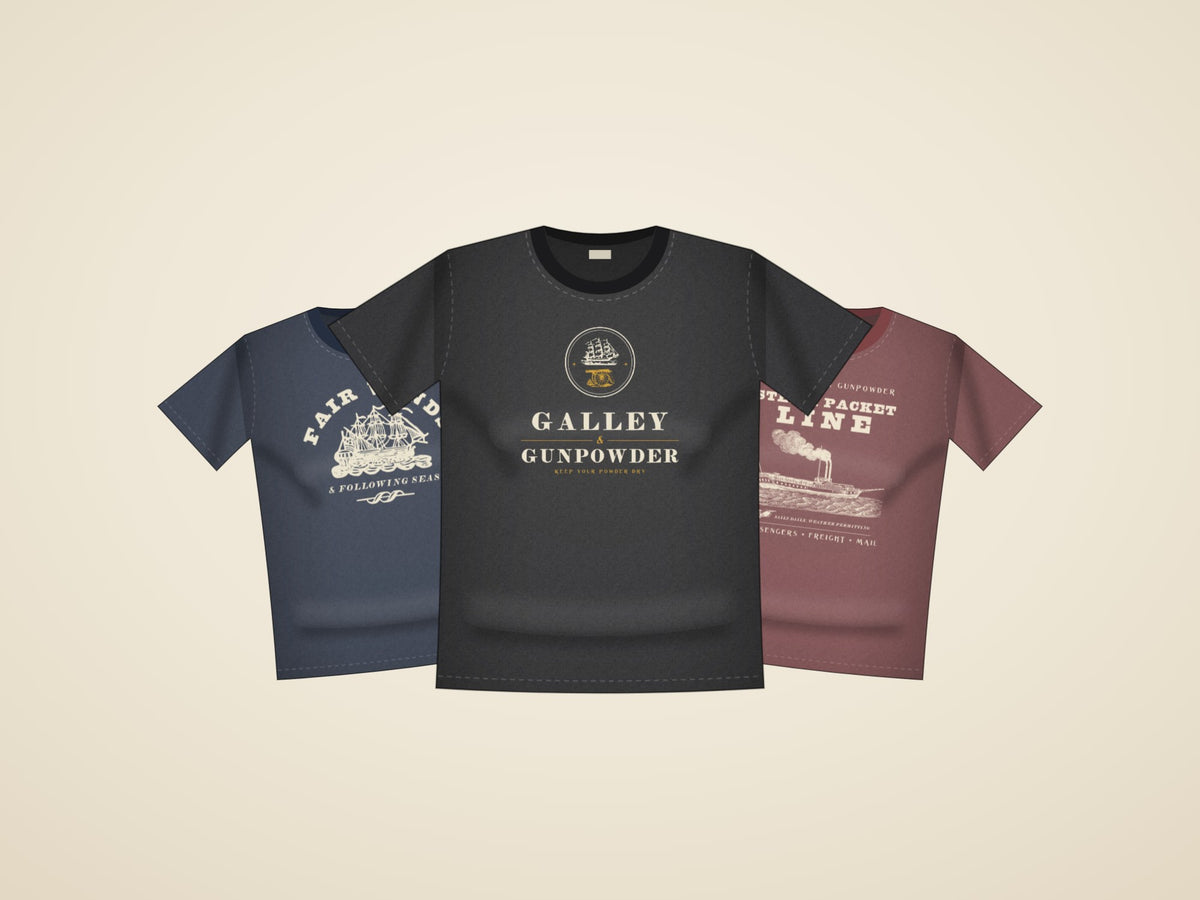 Three shirts from Ships: Fair Winds in true navy, The Flagship in black and Steam Packet Line in brick