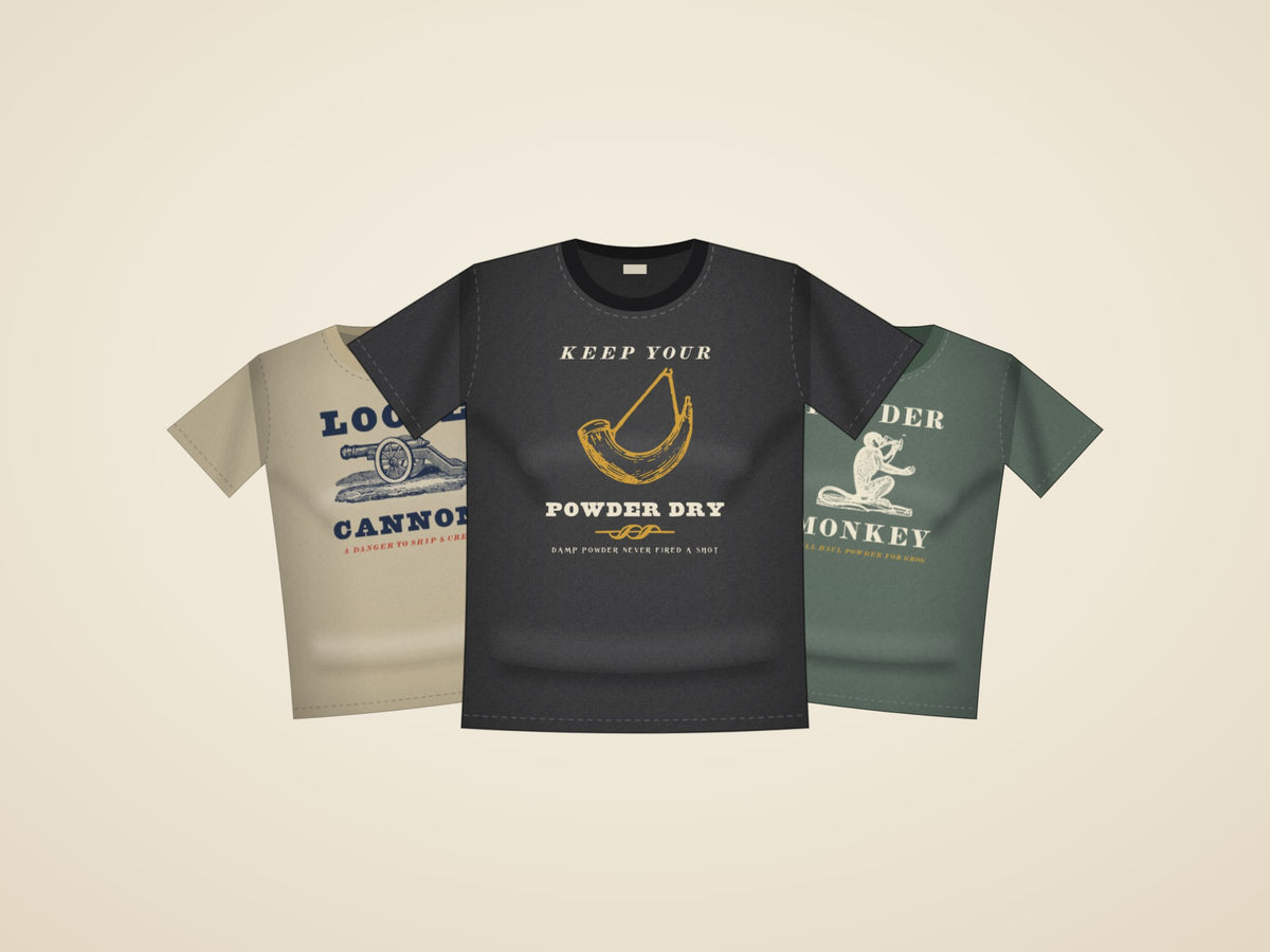 Three shirts from The Powder Room: Loose Cannon in khaki, Keep Your Powder Dry in black and Powder Monkey in blue spruce