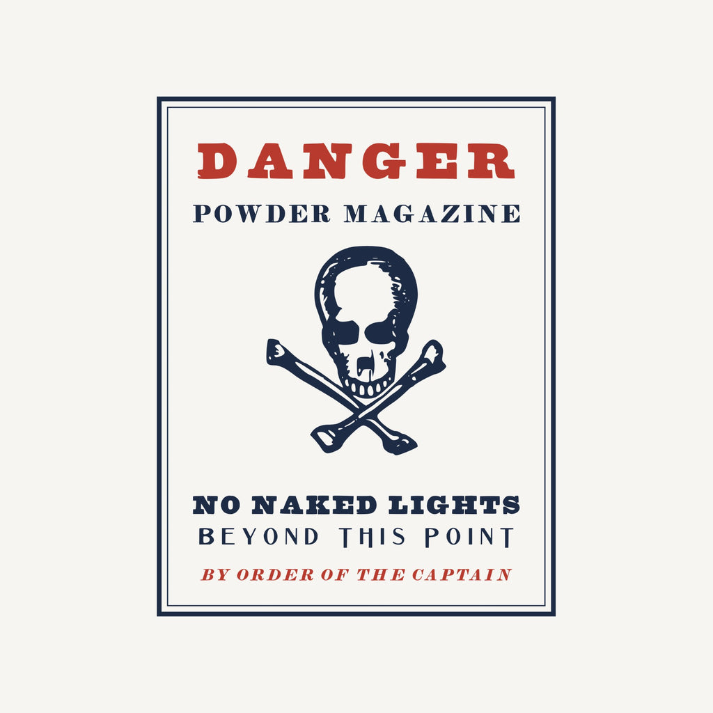 A placard framed in a double rule: DANGER in red capitals, POWDER MAGAZINE, a large skull and crossbones, NO NAKED LIGHTS, BEYOND THIS POINT and BY ORDER OF THE CAPTAIN in red italics.