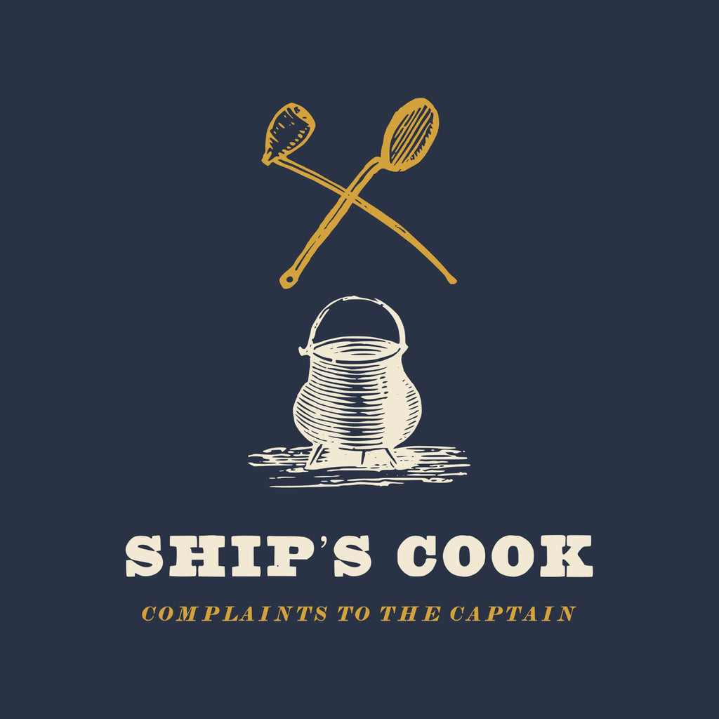 A brass crossed ladle and spoon over a cream engraving of a cooking pot on legs, then SHIP’S COOK in heavy cream capitals and COMPLAINTS TO THE CAPTAIN in brass italic capitals.