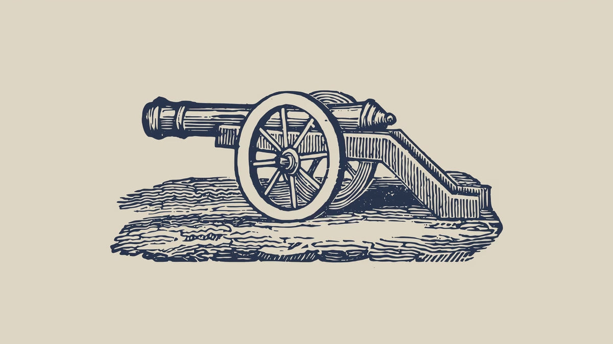 Close-up of an engraved cannon firing